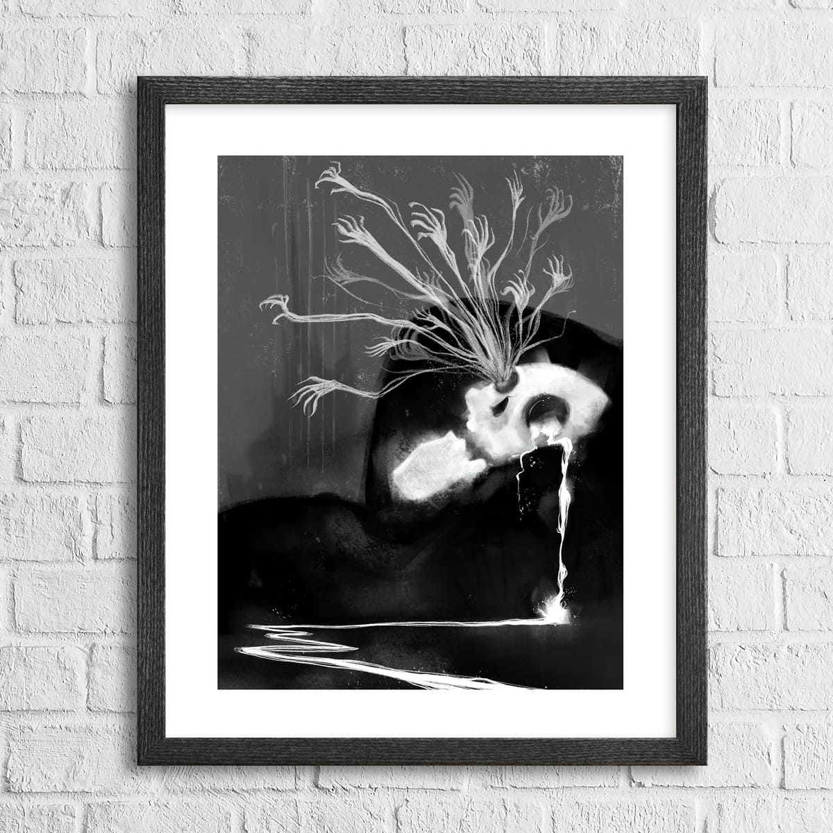 A black and white artwork of a skeletal reaper with ghostly tendrils, framed in a simple black frame, displayed against a white brick wall background.