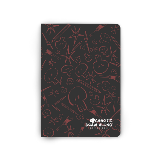 Front view of the black Chaotic Draw Along Sketchbook featuring a red skull-and-brush pattern.