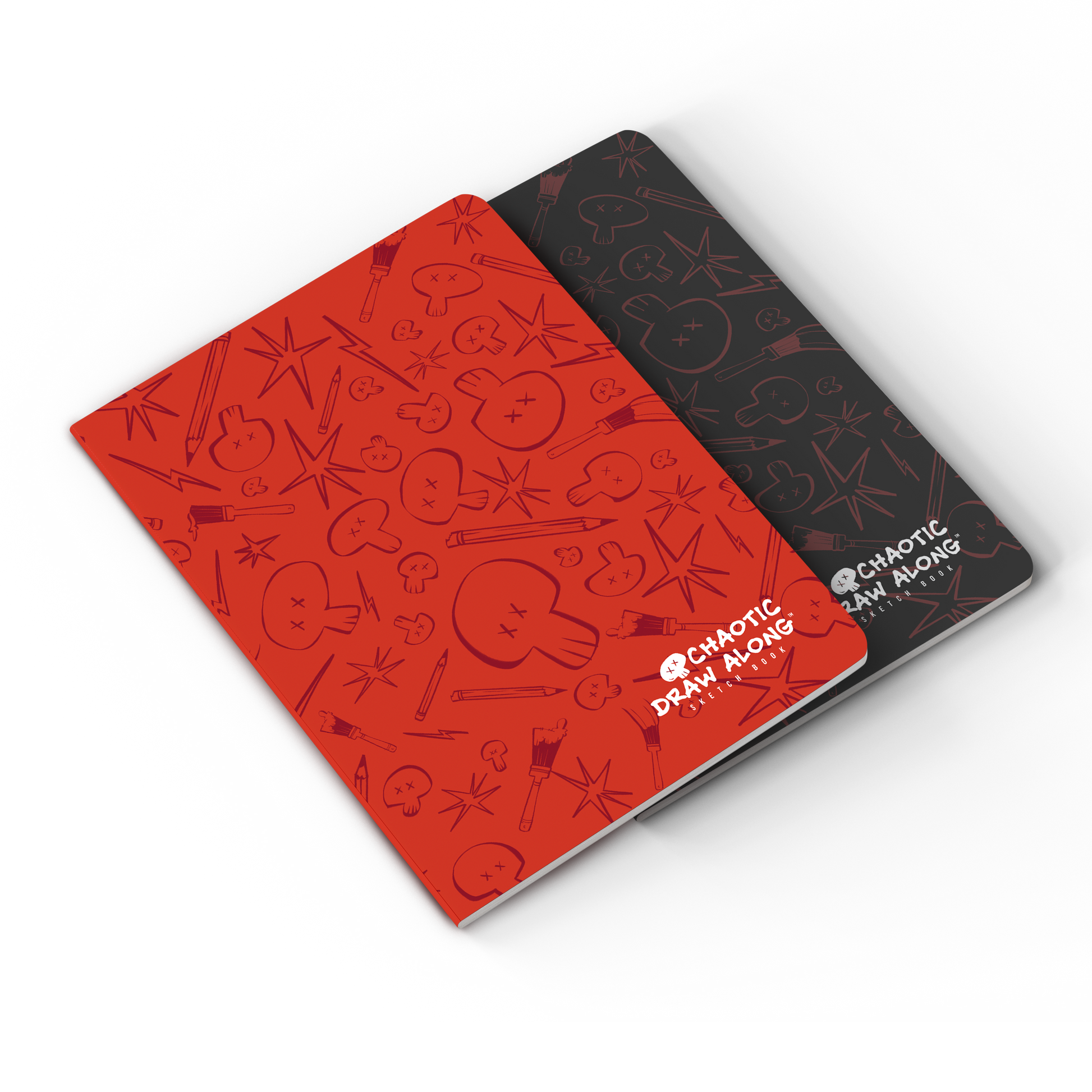Stacked view of red and black sketchbooks with the red one on top.