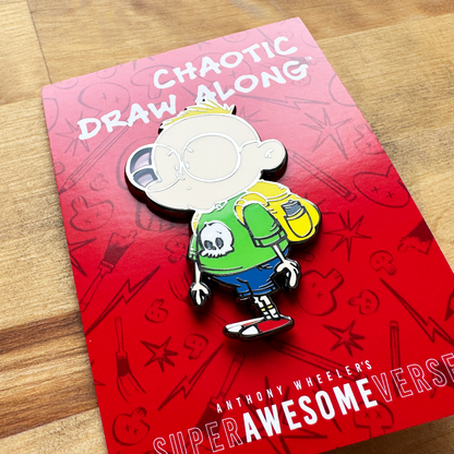 Chaotic Draw Along Gil enamel pin displayed on a red Super Awesomeverse backing card on a wooden tabletop.