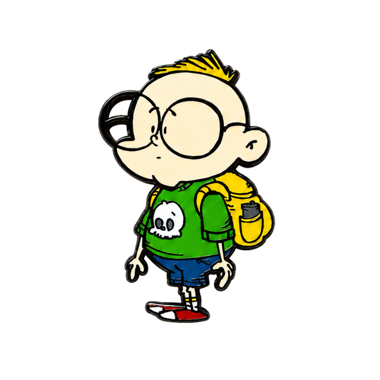Gil hard enamel pin featuring a cartoon character with oversized glasses, green skull shirt, blue shorts, red shoes, and yellow backpack.