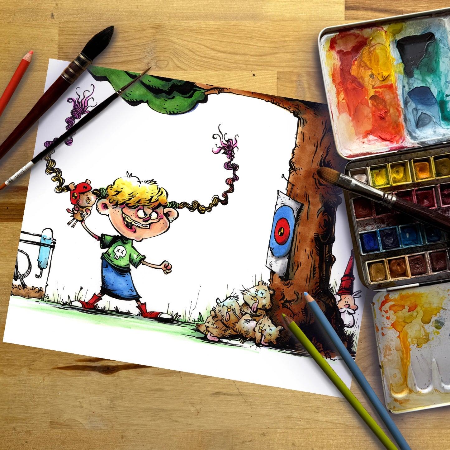 A cartoon illustration of a blonde boy with a chain attached to his head hanging from a tree, surrounded by art supplies including paintbrushes, watercolor paints, and colored pencils on a wooden table.