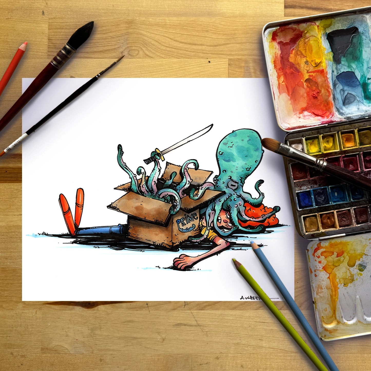 A watercolor illustration on a white sheet of paper, showing a teal octopus emerging from a cardboard box with a sword and orange legs. The sheet is arranged on a wooden table with paintbrushes, watercolor palettes, and colored pencils around it.