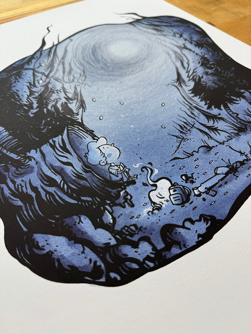 Close-up of Lost in the Woods illustration showing small traveler and campfire in dark forest.